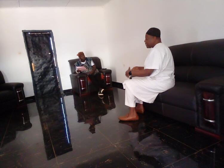 HRH and Chairman of the Bamenda-Nkwe language development committee in a meeting